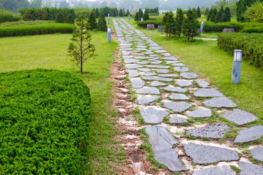 Garden path paved with a natural stone