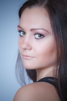 beautiful girl portrait, blue background