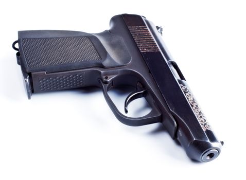 black vintage pistol isolated on white