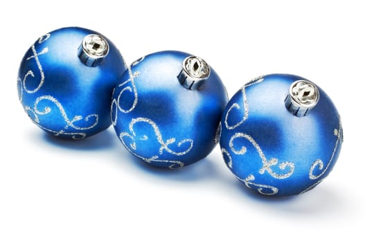 three blue decoration balls isolated on white