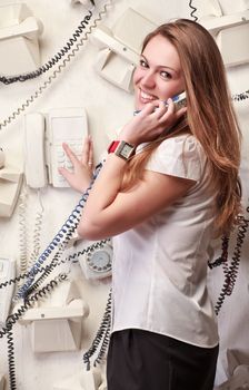 smiling woman talking on phone