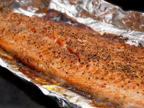 Grilled seasoned salmon on foil