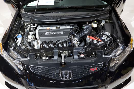 HOUSTON - JANUARY 2012: The Honda Civic Engine at the Houston International Auto Show on January 28, 2012 in Houston, Texas.