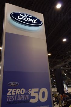 HOUSTON - JANUARY 2012: A Ford sign at the Houston International Auto Show on January 28, 2012 in Houston, Texas.