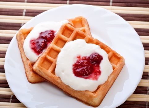 dessert with soft waffle and raspberry jam