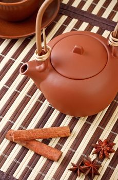 winter tea with cinnamon and star anise on bamboo napkin