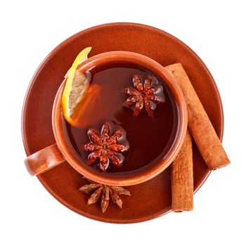 cup of tea with cinnamon sticks and star anise