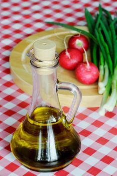 Olive oil with green onion and radish