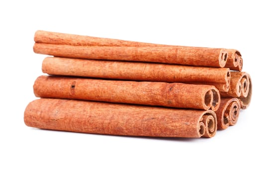some cinnamon sticks isolated on white background