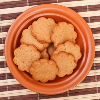 dish of cinnamon cookies on bamboo napkin