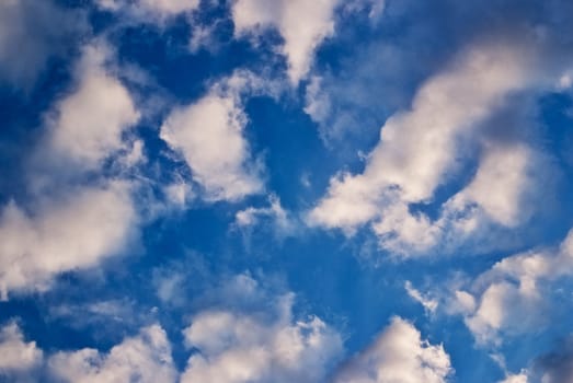 skies with white clouds at sunny summer day