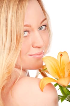 beautiful young woman with lily flower, close-up portrait