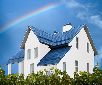 An image of house on background of blue sky                                