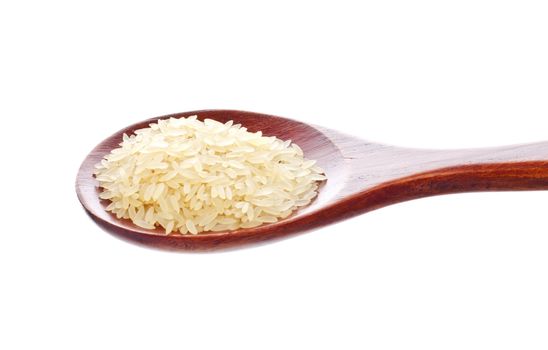 white rice in wooden spoon isolated on white background