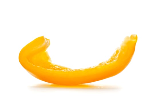 yellow paprika slice isolated on white background