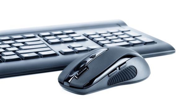 wireless black set mouse and computer keyboard isolated on white