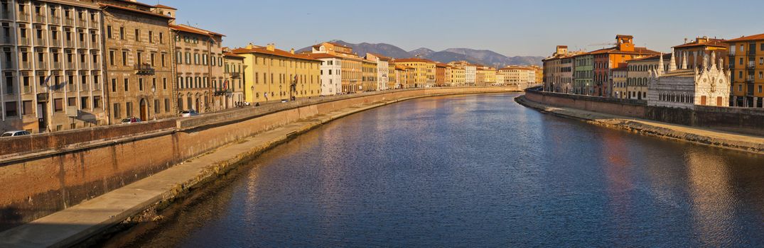 Old architecture and river Arno , Pisa, Italy.