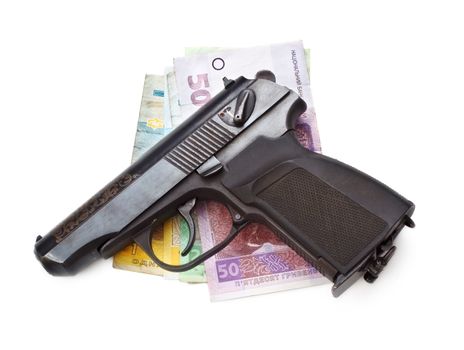 gun and money isolated on white background