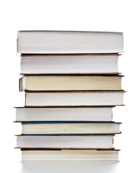 high stack of books isolated on white