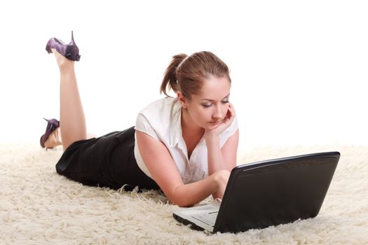 woman laying on floor with laptop computer