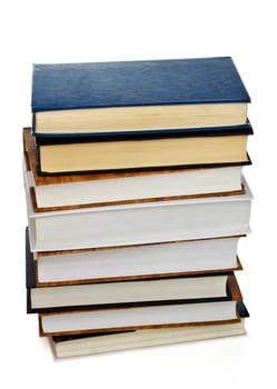 high stack of books isolated on white