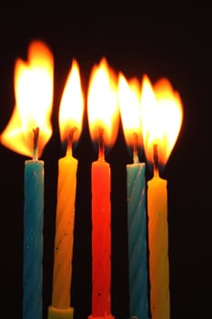 five candles and flames