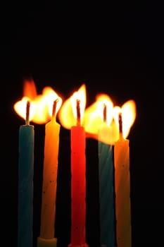 five candles and flames