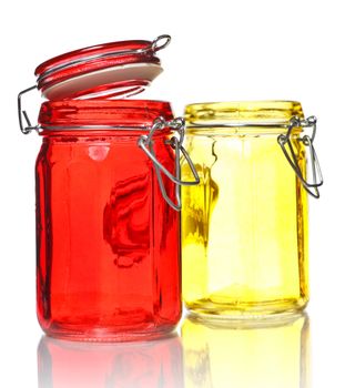 empty glass jars for spice isolated on white