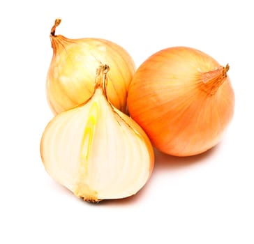 three yellow onions isolated on white background