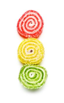 spiral marmalade sweets like traffic light isolated on white
