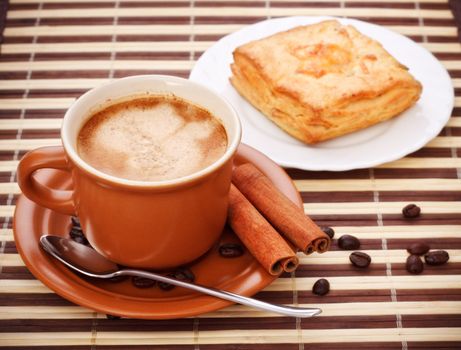 coffee cup and pie on bamboo napkin