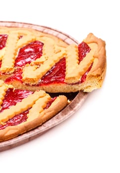 sliced pie with cherry jam isolated on white