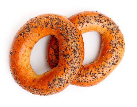 two bagels with poppy seeds isolated on white background