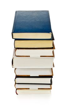 high stack of books isolated on white