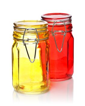 empty glass jars for spice isolated on white