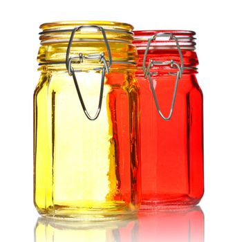 empty glass jars for spice isolated on white