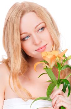 portrait of pretty woman with yellow lily