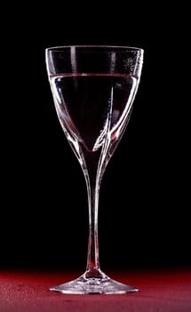 mineral water glass isolated on black background