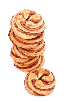 fresh cinnamon cookies tower isolated on white background