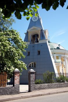 Modern pyramide church at sunny summer day