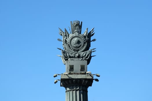 Triumphal column of admiral Ushakov on blue sky background