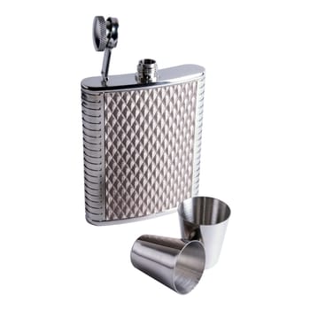 alcohol grooved flask and two steel drinks laying beside