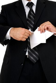 businessman in black suite and white shirt tear paper