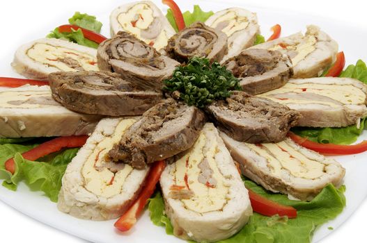 cut into a plate of meatloaf on white background