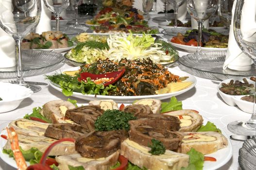 holiday table with dishes and utensils in a restaurant