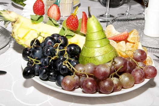 fruit dessert on the holiday table in a restaurant