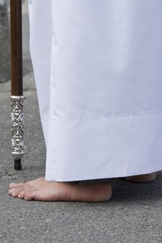 Easter nazarene in white robe in a typical Spanish procession. 