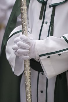 Easter nazarene in white robe in a typical Spanish procession. 