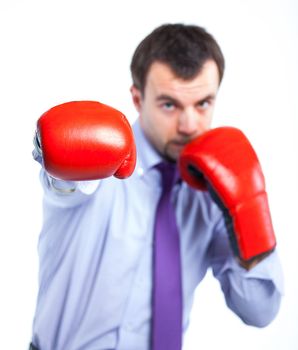 Portrait of a  business man in red boxing gloves isolated on white background. Studio shot.
