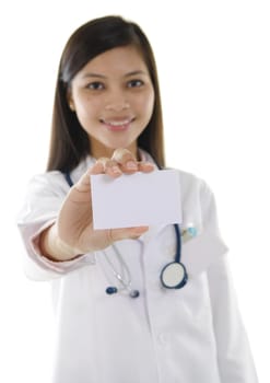 Medical doctor showing business card sign, blank with copy space for text or design.